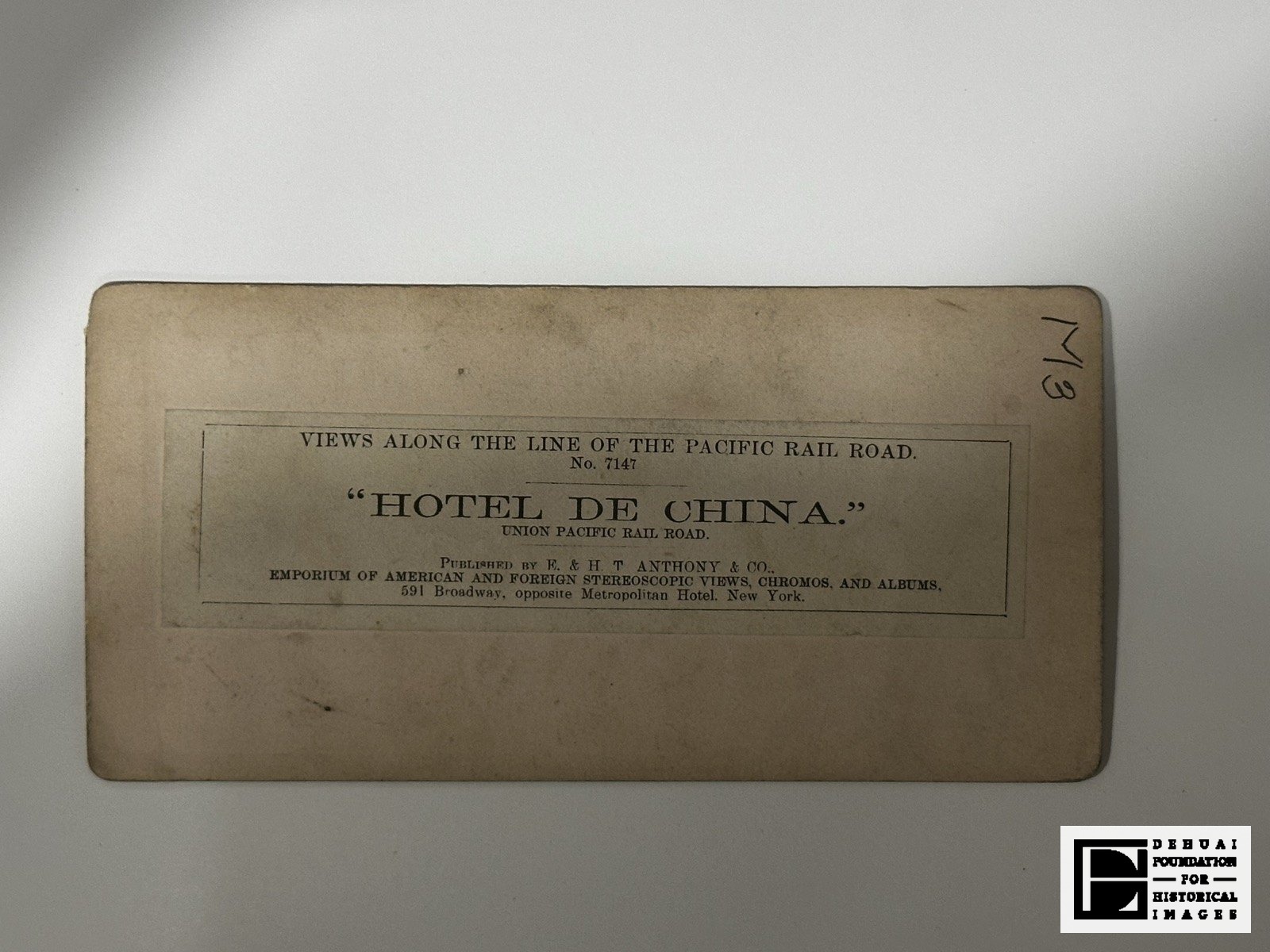 TFA-CA-104 — Verso: the printed Anthony label naming the view “Hotel de China”.